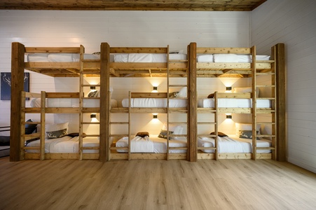 Upstairs bunk room (sleeps 21) - triple stacked twin bunk beds shown