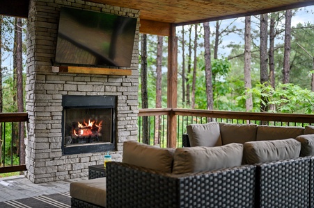 Outdoor entertaining area with seasonal gas fireplace