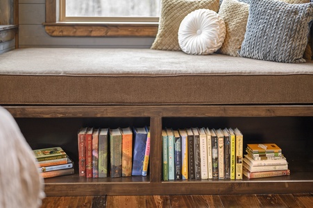 Custom reading nook with selection of books provided