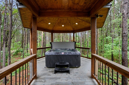 Hot tub under beautiful covered gazebo for relaxing soaks