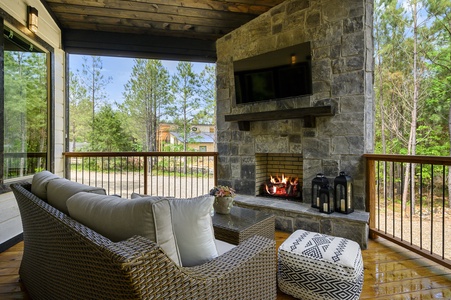 Covered patio provides great outdoor space for relaxing during your stay