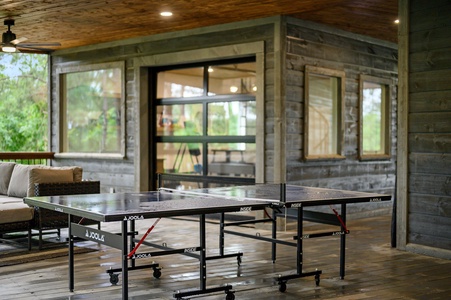 Enjoy a game of ping pong on the covered back deck, rain or shine