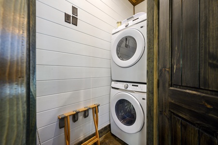 Laundry closet has a full-size washer and dryer