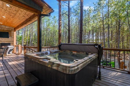 Enjoy a warm soak in the hot tub while watching your favorite show