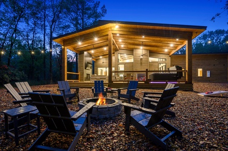 Rearview of firepit toward cabin