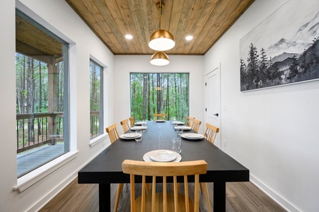 Dining table seats 8 with beautiful forest views