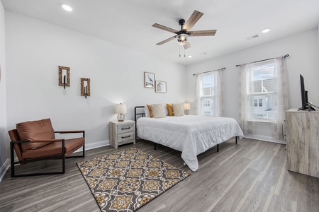 The Primary Bedroom is the perfect place after a day of golf or fun on the beach.