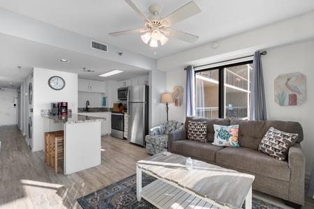 Relax in this bright, modern space with comfortable seating and a fully equipped kitchen for your home-away-from-home experience.