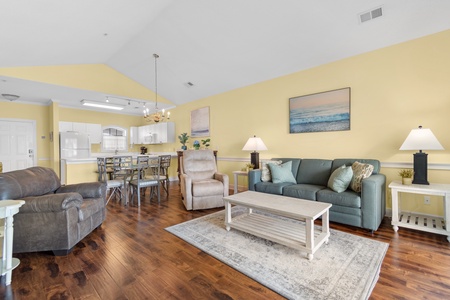 Spacious 2 bedroom Myrtlewood Golf Condo with updated flooring and tall ceilings.