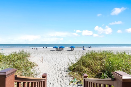 You’re this close to the beach—walk out and let the waves greet you in minutes.