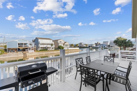Enjoy a summer meal overlooking the Cherry Grove water