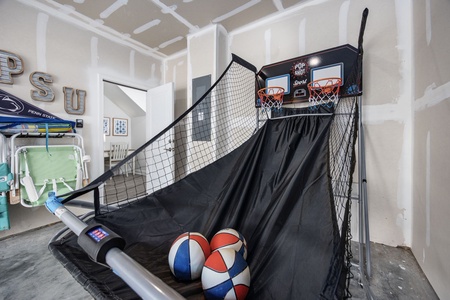 Take a try at pop-a-shot in the garage along with some other games.