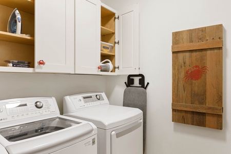 Free in-unit washer and dryer with starter pack of laundry detergent.