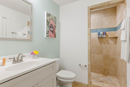 Bathroom 2 features a walk-in shower.
