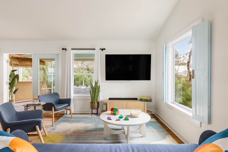 The living room is equipped with a 55-inch smart TV with streaming apps. Fast and reliable Wi-Fi comes standard in all our homes.