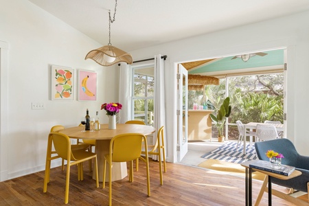 The dining table comfortably seats 6 and is steps away from the screened in back patio.