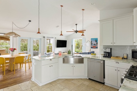 Fully equipped kitchen stocked with basic ingredients, soaps and cleaning supplies. There’s a full knife set, a cooking and bakeware set, coffee station, microwave, toaster oven & blender.