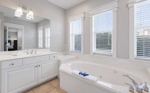 Primary Bathroom Equipped with a Relaxing Jacuzzi Tub