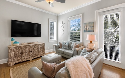 Comfy second floor living room with a sofa and loveseat