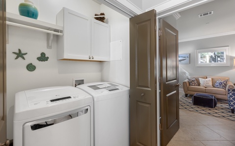 Full-size washer and dryer on the first floor