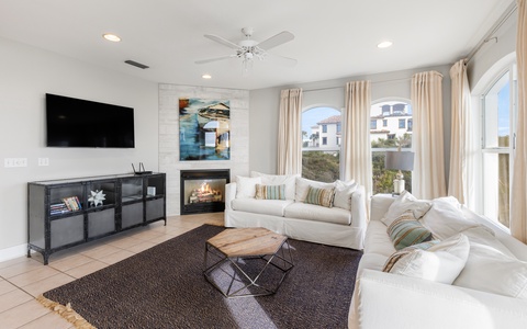 Cozy Living Area Featuring a Fireplace and TV