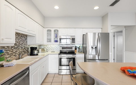 Equipped with Sleek Stainless Steel Appliances