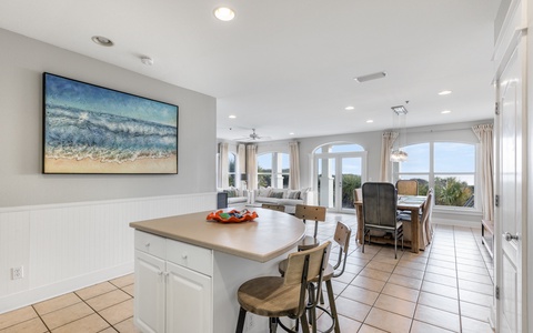 Open Kitchen Flowing into Living and Dining Areas