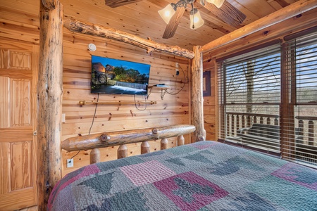 Bedroom flat screen at Natural Wonder, a 4 bedroom cabin rental located in Gatlinburg