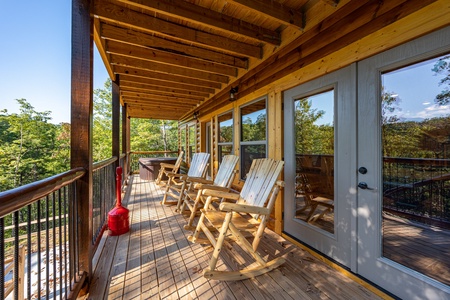 Rockers on covered deck at Make A Splash, a 2 bedroom cabin rental located in gatlinburg