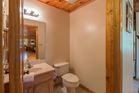 Half bath at Moose Lodge, a 4 bedroom cabin rental located in Sevierville