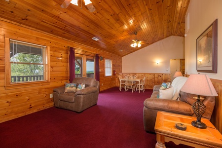 Living room with a sofa and chair at Moose Lodge, a 4 bedroom cabin rental located in Sevierville