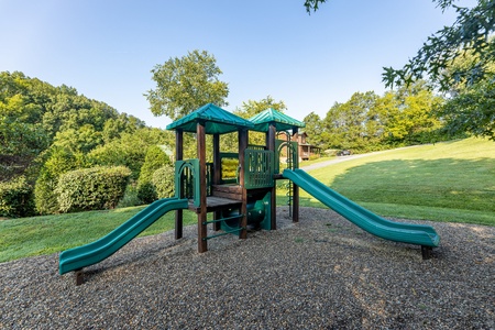 Playground for guests at Family Getaway, a 4 bedroom cabin rental located in Pigeon Forge