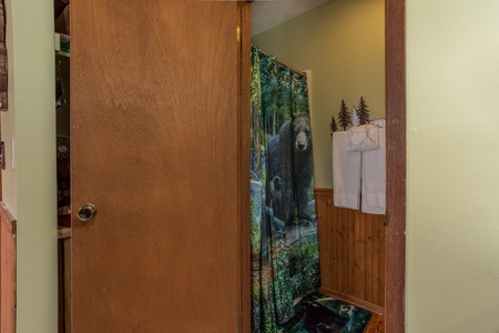 Bathroom off the bedroom space at Bear Mountain Hollow, a 1 bedroom cabin rental located in Pigeon Forge