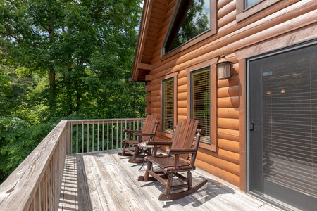 Rocking chairs on the open deck at Mountain Lake Getaway, a 3 bedroom cabin rental located at Douglas Lake