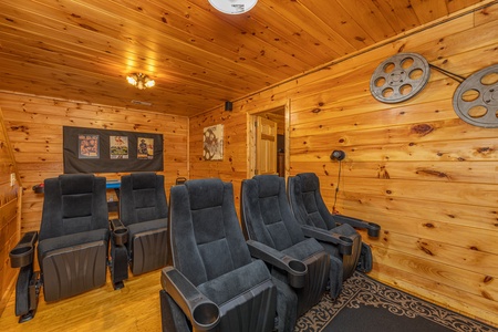 Theater room seating at A Moment in Time, a 2 bedroom cabin rental located in pigeon forge