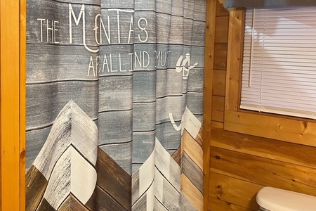 Mountain shower curtain at A Bear on the Ridge, a 2 bedroom cabin rental located in Pigeon Forge