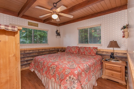 Second bedroom with a king-sized bed at Bushwood Lodge, a 3-bedroom cabin rental located in Gatlinburg