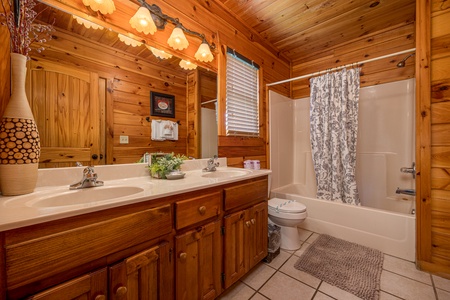 Bathroom with Tub and Shower Combo at Logged Out