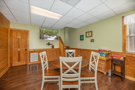 Four person table at Southern Charm, a 2 bedroom cabin rental located in Pigeon Forge