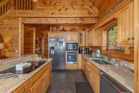 Kitchen with stainless appliances at Mountain Mama, a 3 bedroom cabin rental located in Pigeon Forge
