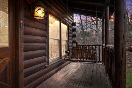 Deck swing at Country Bear's Getaway, a 3-bedroom cabin rental located in Gatlinburg