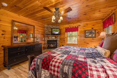 King bedroom at Moonbeams & Cabin Dreams, a 3 bedroom cabin rental located in Pigeon Forge