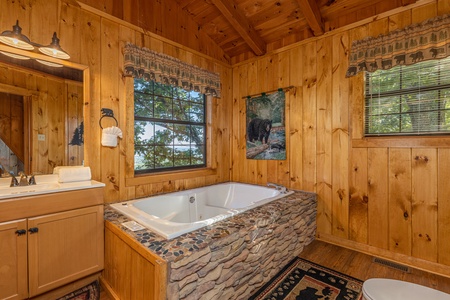 Jacuzzi tub in loft bathroom at Cozy Mountain View, a 1 bedroom cabin rental located in Pigeon Forge