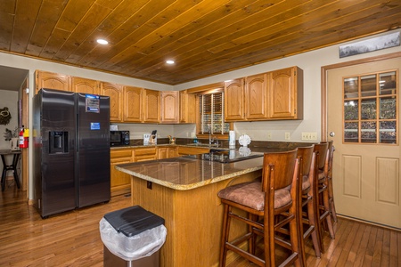 Kitchen With Breakfast Seating at Rocky Top Ridge Views
