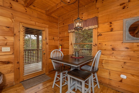 Dining table for four at Livin' Simple, a 2 bedroom cabin rental located in Pigeon Forge