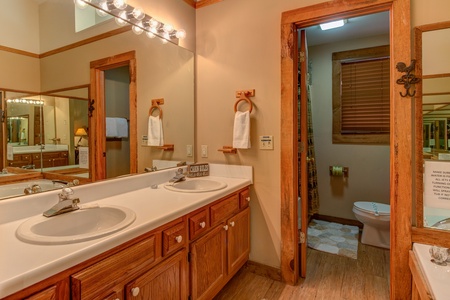 Bathroom with a double vanity at Just for Fun, a 4 bedroom cabin rental located in Pigeon Forge