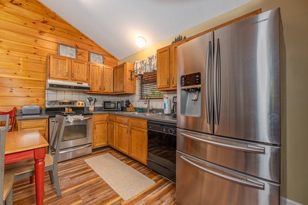 Kitchen amenities at Copper Owl, a 2 bedroom cabin rental located in Pigeon Forge