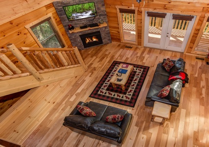 Looking down at the living room at Canyon Camp Falls, a 2 bedroom cabin rental located in Pigeon Forge