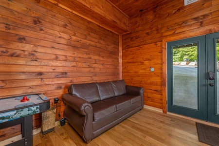 Game room seating at Sky View, A 4 bedroom cabin rental in Pigeon Forge