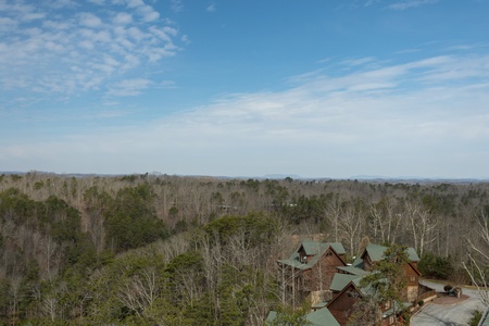 Looking at the valley and cabins in the resort at Better View, a 4 bedroom cabin rental located in Pigeon Forge